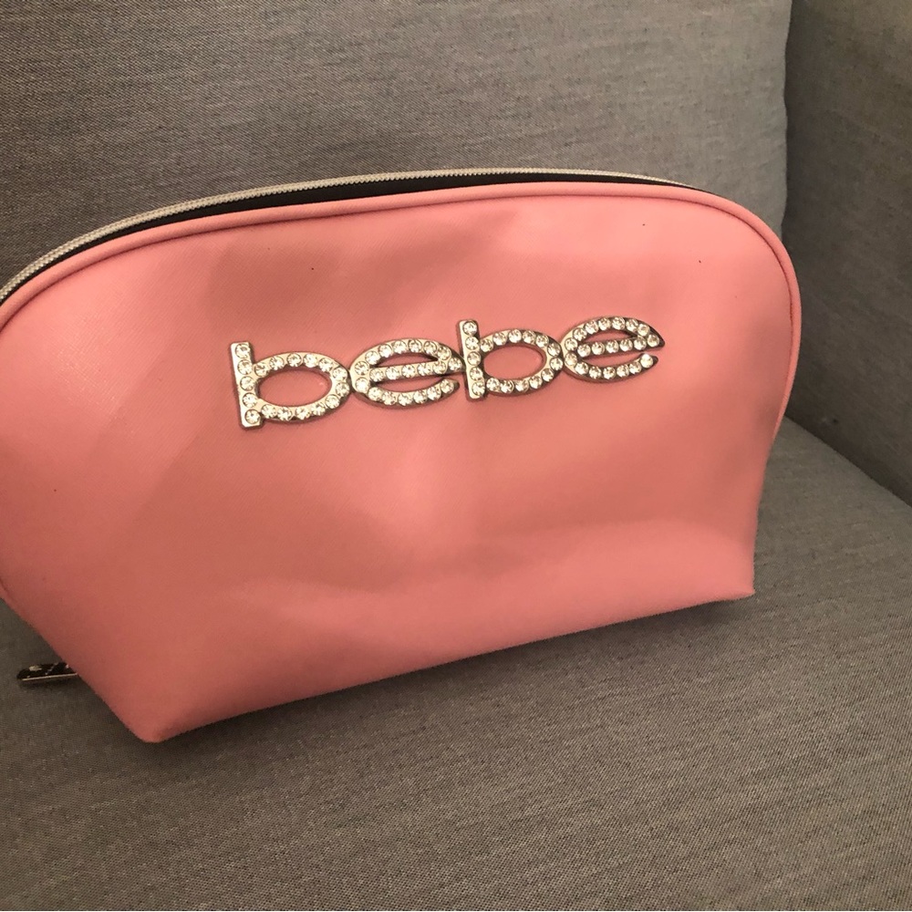 Bebe pink makeup bag